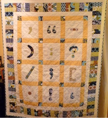 Tina Anson Mine's punctuation-themed quilt.