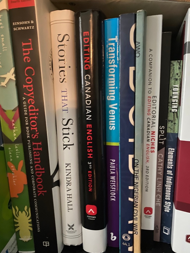 Ten books on a shelf