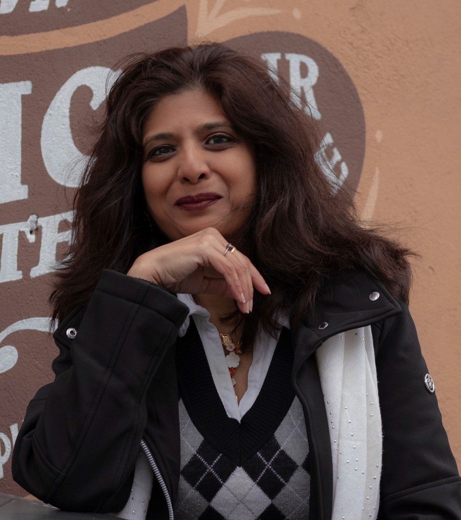 A headshot of Amber Riaz.