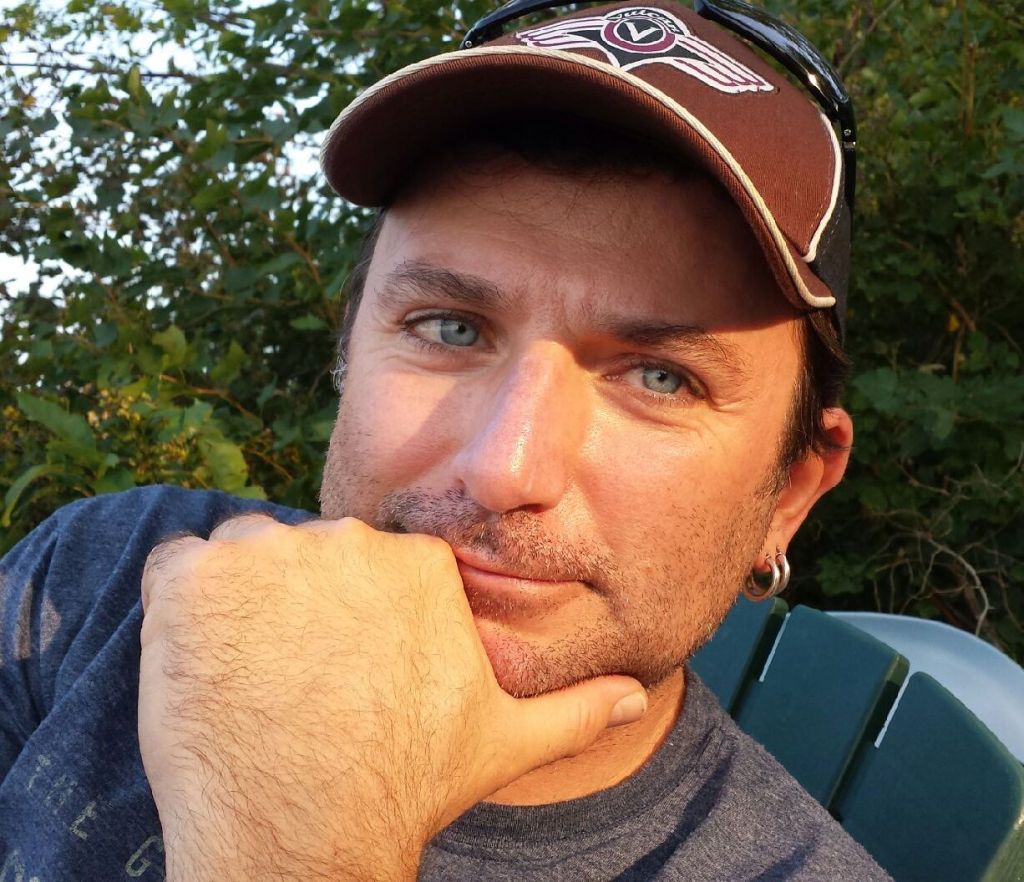 A headshot of Mike Madill.