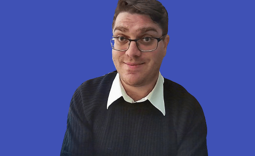 A headshot of Alex Benarzi.