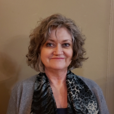 A headshot of Donna-Lee Wybert.