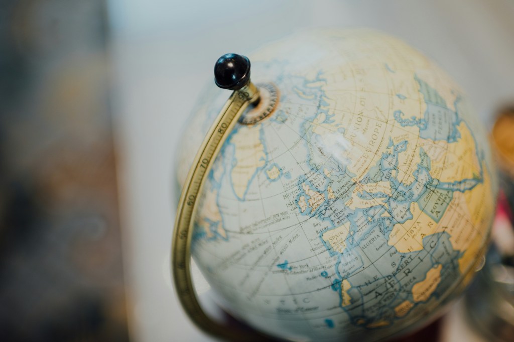 A blue and gold desk globe