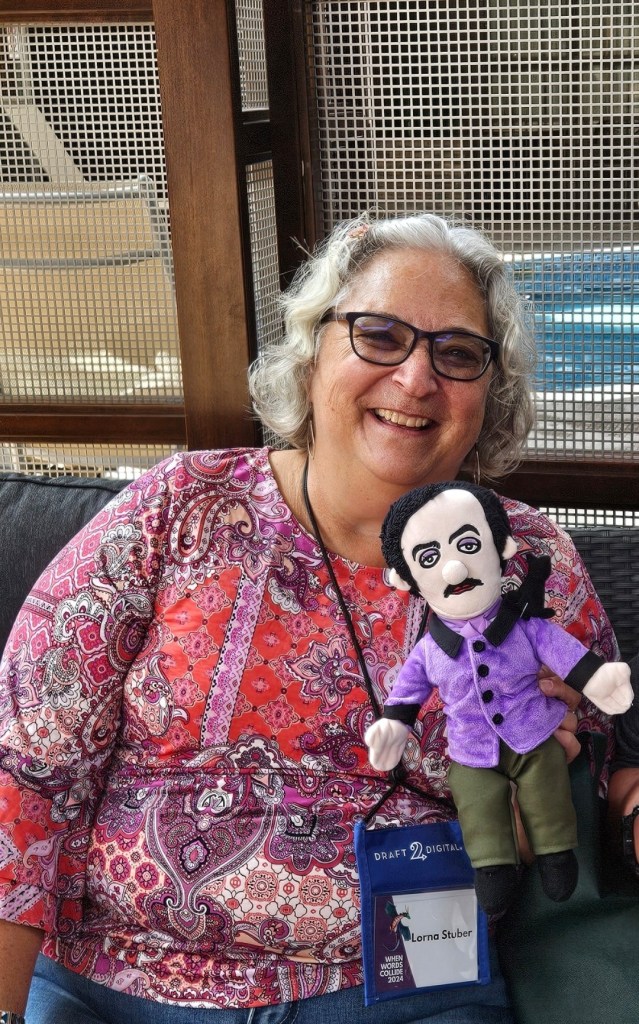 Photo of Lorna Stuber with Edgar Allan Poe stuffy.