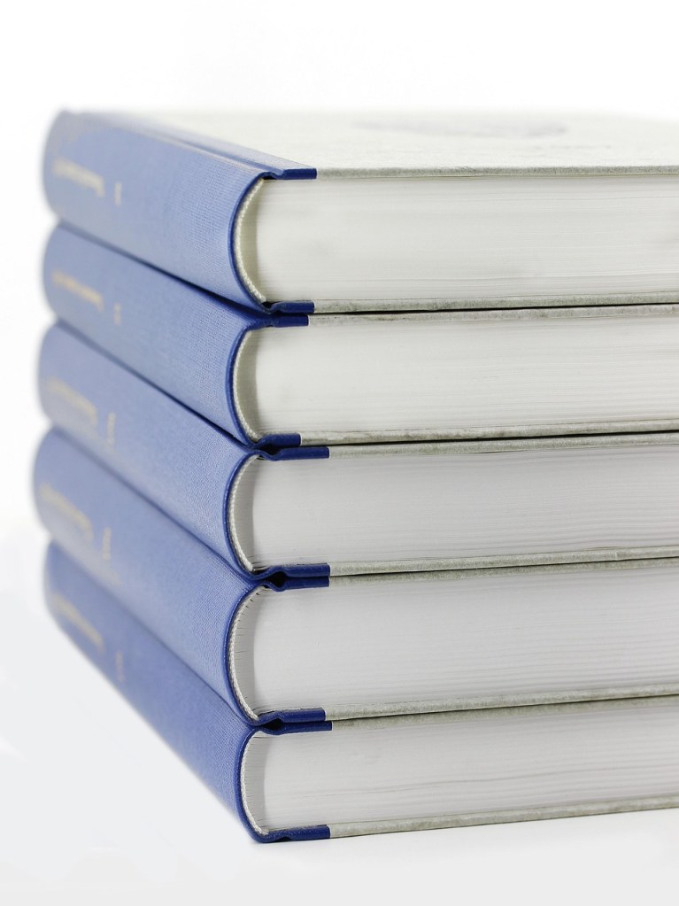 A stack of identical books.